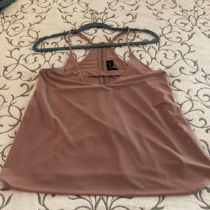 Cute day trip tank with cutout detail.